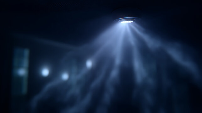 Mysterious blue light shining down from above, illuminating a dark scene