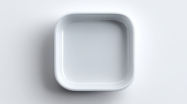 A sleek, empty, square-shaped container in a modern, minimalist design. The container sits on a clean, bright surface. The design is contemporary and simple, suitable for diverse uses