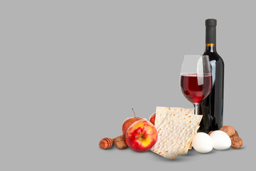 Fototapeta premium Wine, matzah, apples, eggs, and nuts set for Passover meal
