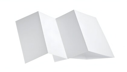 Angled view of a blank, white, folded paper with sharp creases against a white backdrop