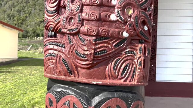 Hei Tiki Maori traditional carving, man symbol, Cultural Heritage. Punawhakareia Marae, New Zealand