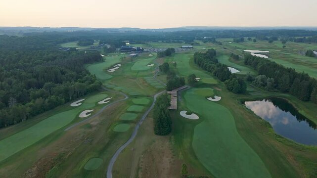 Drone flight over the green landscapes of Osprey Valley, capturing the peaceful atmosphere of one of Canada's top-rated golf destinations