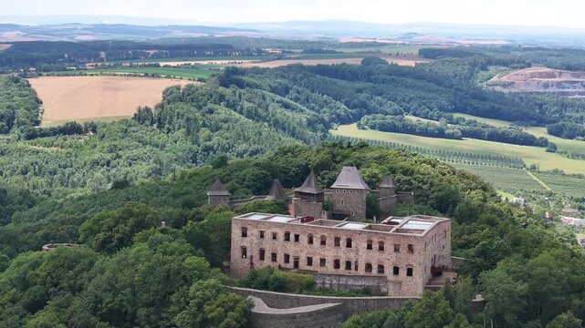 Historic Helfstyn Castle on hill, and countryside of Moravia region, Czech Republic. Drone panorama