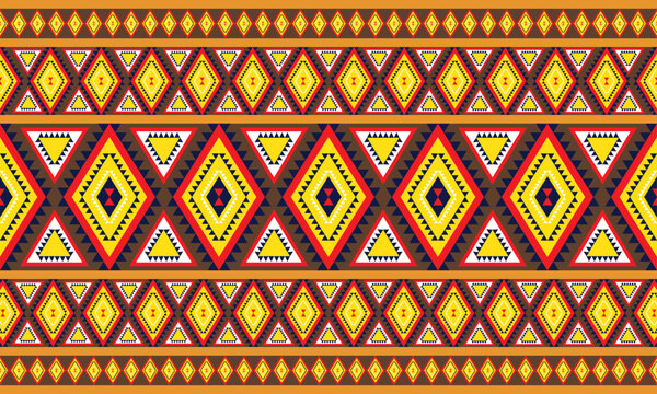 Vibrant ethnic geometric textile pattern inspired by traditional tribal weaving. This bold design features repeating diamond and triangle motifs in warm tones of red, yellow, blue, and black. The symm