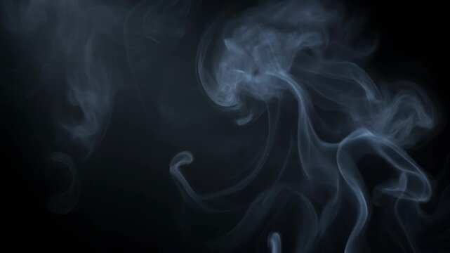 Abstract swirling smoke patterns on black background creating mystical and mysterious atmosphere