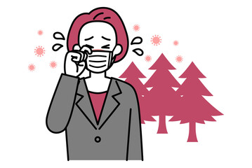 花粉症がつらい中年のスーツの女性