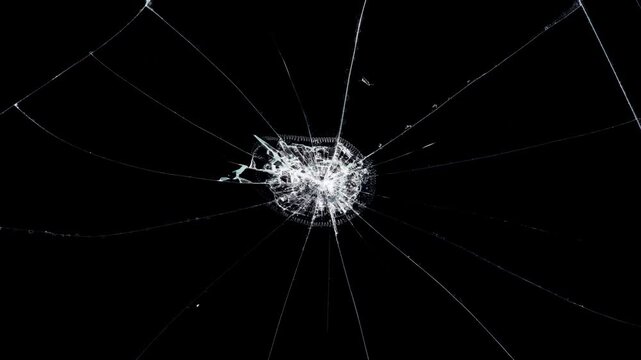  Shattered glass animated overlay,Cracked glass fracture effect on black background.
 Realistic Glass impact crack with detailed fractures on a black background.