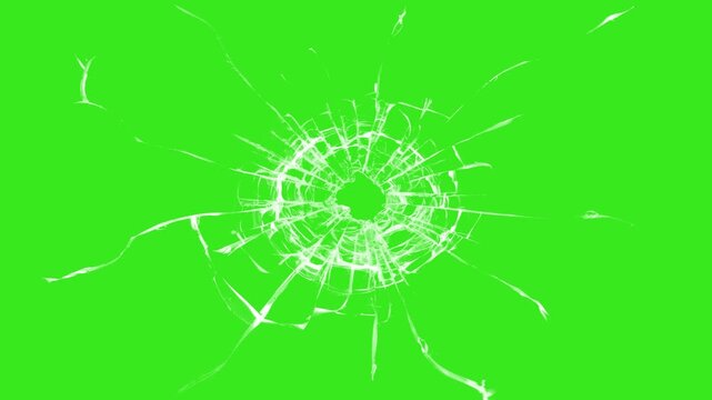 Breaking glass motion graphics. Cracked and Shattered black glass with slow motion.
Shattered and broken glass shards flying through the air after crush broken window on a Green.