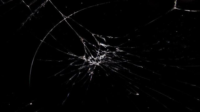 Pack of Cracked and Shattered black glass realistic footage. Realistic Glass impact crack with detailed fractures on a black background. 
Cracked glass animation, transparent 4K video,