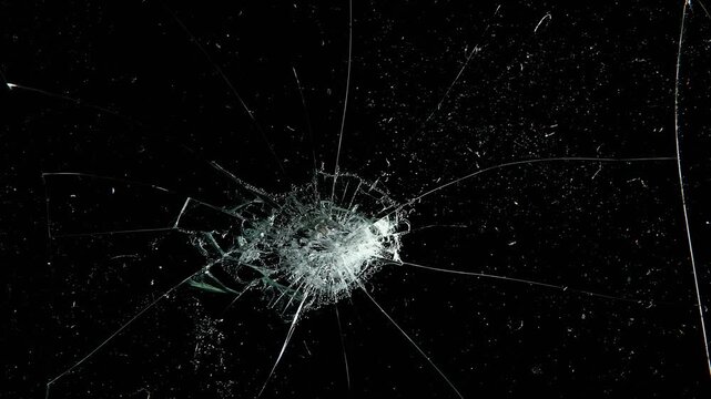 Pack of Cracked and Shattered black glass realistic footage. Realistic Glass impact crack with detailed fractures on a black background. 
Cracked glass animation, transparent 4K video,