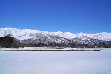 雪景色の白馬村と北アルプス © sunftaka77