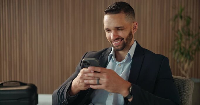 Phone, happy and business man in airport lounge for layover notice, flight schedule and contact. Communication, boarding pass and travel update with person and tech in lobby for waiting room