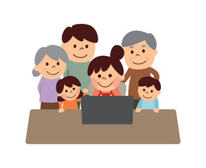 パソコンを見ている三世代家族