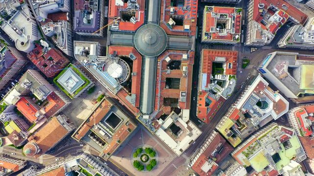 Milan, Italy. Gallery of Victor Emanuel II 1865-1877 year of construction. Roofs of the city Drone footage, HEAD OVER SHOT