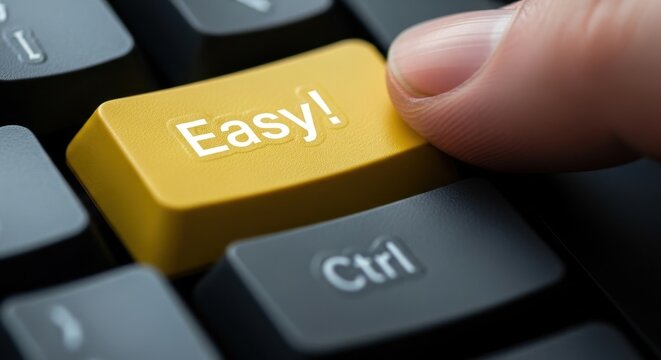 Finger Pressing Yellow Easy! Button on Computer Keyboard