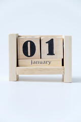 Wooden block calendar for January 01 isolated on white background