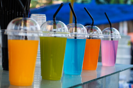 Colorful Synthetic Sarbat Drinks Displayed at Street Stall in Kolkata