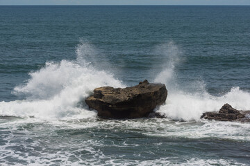 Powerful Tropical Ocean Waves Crashing on Volcanic Rocks &ndash; Dramatic Bali Seascape Energy