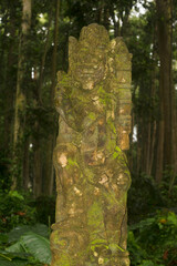 Moss-Draped Fierce Guardian in Deep Jungle &ndash; Balinese Mystical Solitude