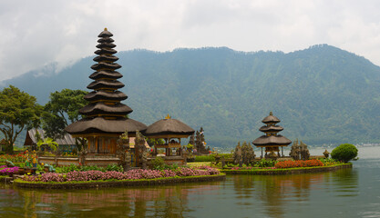 Iconic Lakeside Temple with Tiered Towers Amid Misty Mountains &ndash; Bali Tropical Serenity