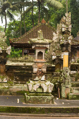 Mystical Moss-Covered Balinese Shrine in Lush Jungle Temple Grounds &ndash; Serene Tropical Spirituality