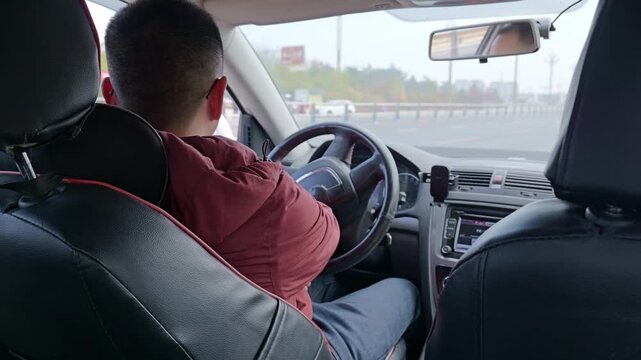 Inside view of the car pulling onto the main road.