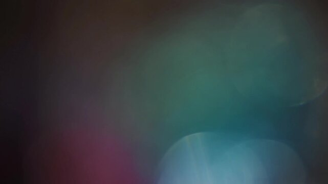 Light leak and bokeh overlay with shifting colors and soft focus. Ideal for adding cinematic flair and mood to video projects.