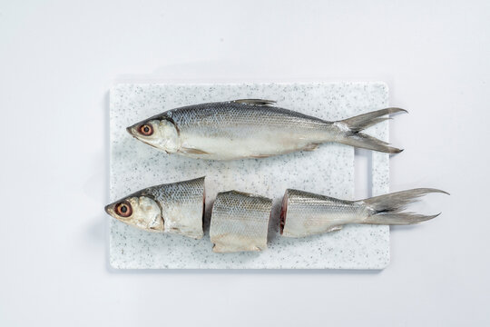 Milkfish (Ikan Bandeng) is a tropical seafood fish commonly farmed in Southeast Asia, especially Indonesia. Known for its shiny silver skin, elongated body, and tender white meat.