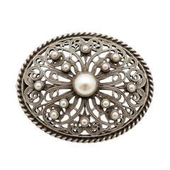 Intricate vintage-style brooch with ornate filigree and central gemstone design