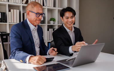 Fototapeta premium Team Of Business working at office with documents on his desk, doing planning analyzing the financial report, business plan investment, finance analysis concept 