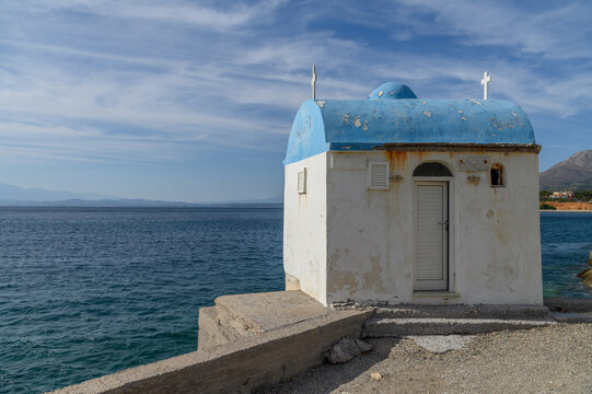 Coastal chapel with blue dome in Elea, Laconia, Peloponnese, Greece