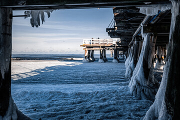 Frozen old wooden pier on the Baltic Sea in Sopot	
