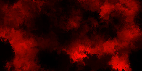 Fototapeta premium Abstract grunge red and black powder explosion cloud on black background. dark red smoke Like cloud wave effect on black. dark fire flame grunge texture background. toned fiery red sky.