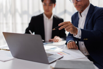 Fototapeta premium Graphs and charts to analyze market data, balance sheet, business account, net profit to plan new sales strategies to increase production capacity.