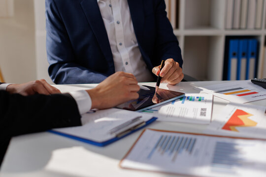 Business team working at office, finance, accounting with laptop computer on table, budget management. Doing finance, budgeting and tax calculation
