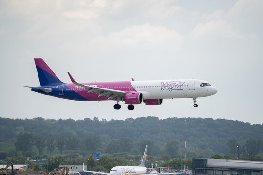 Wizz Air Airbus A321neo airplane landing at John Paul II International Krak&oacute;w Balice Airport near Cracow. Lowcost airline plane final approach, arrival at destination on May 11, 2024 in Krakow, Poland