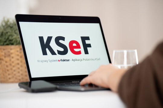KSeF Krajowy System e-Faktur logo sign on a laptop computer. Government e-Invoicing tax platform for issuing, receiving, and storing structured XML invoices on February 17, 2026 in Krakow, Poland.