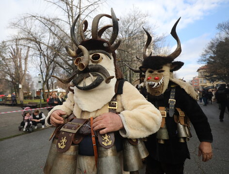 Kyustendil, Bulgaria - February 7, 2026: Third Masquerade Festival "Djamala" in Kyustendil, Bulgaria. People with masks, called Kukeri, dance and play to scare away evil spirits.