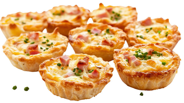 A plate of mini quiches with ham and onions
