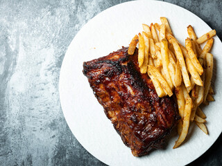 Barbecue ribs on a plate © mnimage