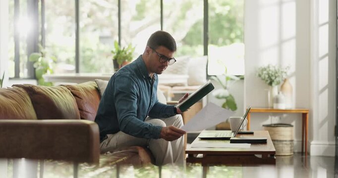 Tablet, freelancer and documents with man on sofa for blog writer, virtual editor and newsletter promotion. Online magazine article, remote worker and paperwork with person in living room of home