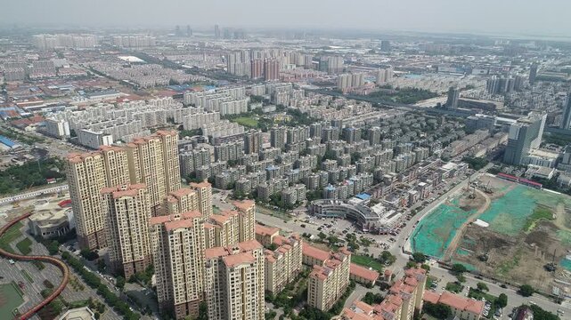 Drone flight over residential neighborhood in suburbs of Suzhou city, China
