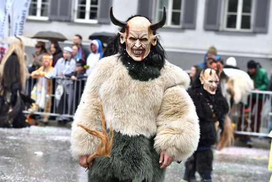 February 14, 2026, Chur, Graub&uuml;nden, Switzerland, Carnival in Chur on February 14, 2026.
Several drummers with masks and traditional garments play their instruments. confetti covers the street, and sp