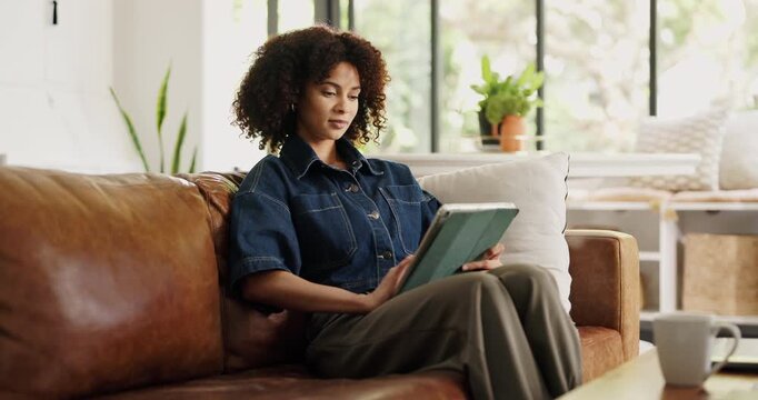 Scroll, research and woman with tablet, lounge and writer with freelance project, online or creative. Home, remote work and African person with tech on couch, info or planning for social media script