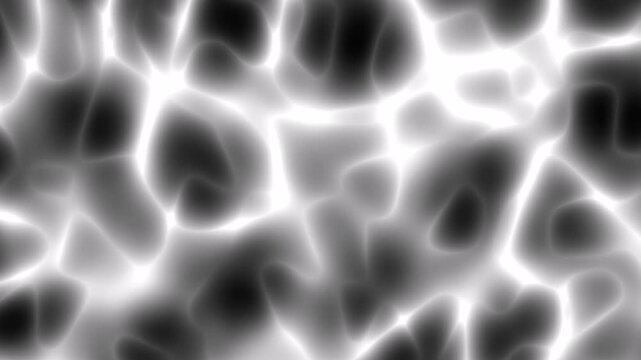 Abstract motion graphic background featuring smooth flowing white light waves over a deep black background, creating elegant contrast and a modern minimalist dynamic atmosphere.