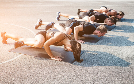 Sporty team during workout outdoor