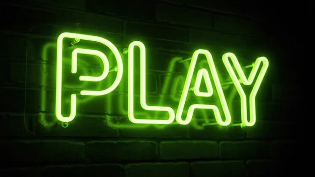 Vibrant neon sign reading PLAY on dark brick wall background