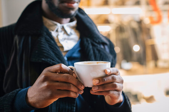 African american man drinking coffee