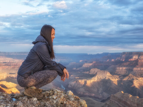 USA, Arizona, Grand Canyon National Park, tourist enjoying the view