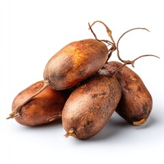 Close up of brown pods on white background